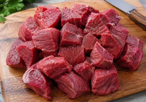 Raw halal boneless beef cubes for curry cooking